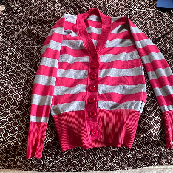 Sweaters - This is a grey and pink sweater made of cotton.It is a size M but stretchy.